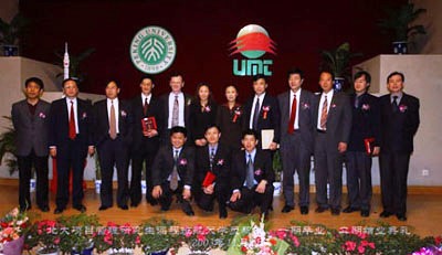 Students from the China space program taking a picture with Dr. Frame and Dr. Chen.