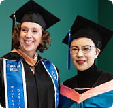A UMT graduate posing with families and friends