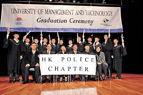 Twelve Hong Kong JPOs receiving their BBA degree from the UMT
