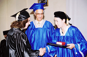UMT President handing out diploma during commencement in Morocco